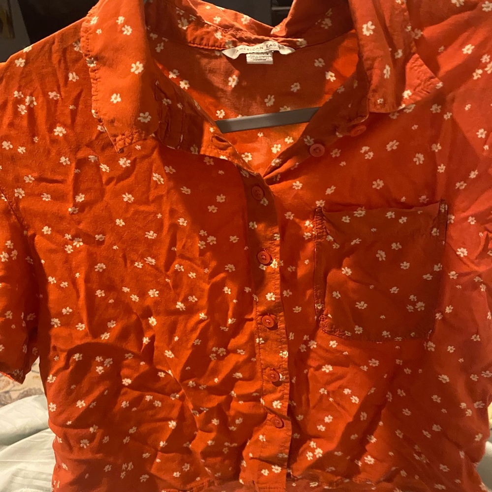 pink with white flowers short sleeve button up shirt size xs american eagle
